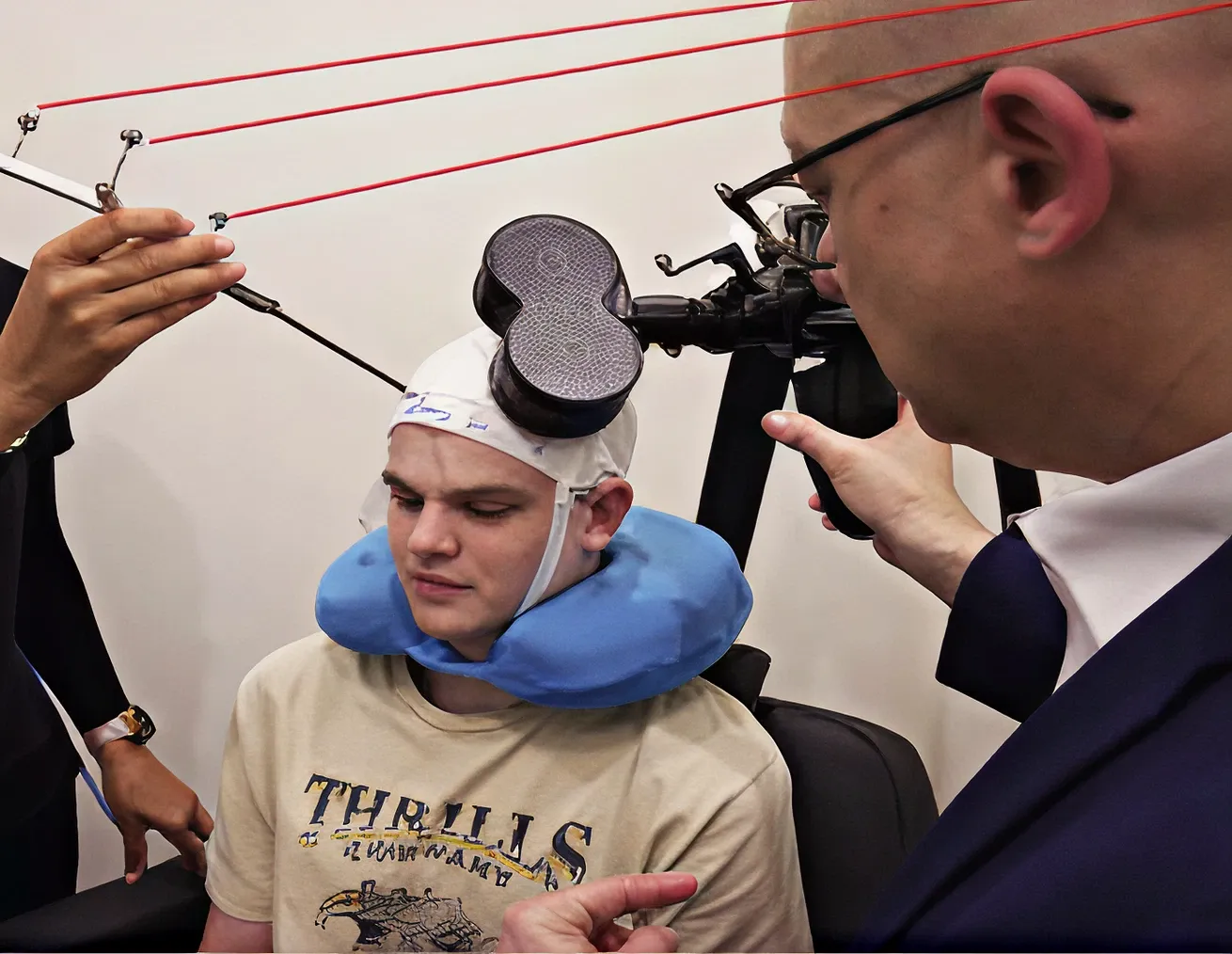 A patient receiving precision TMS guided by the clinical team